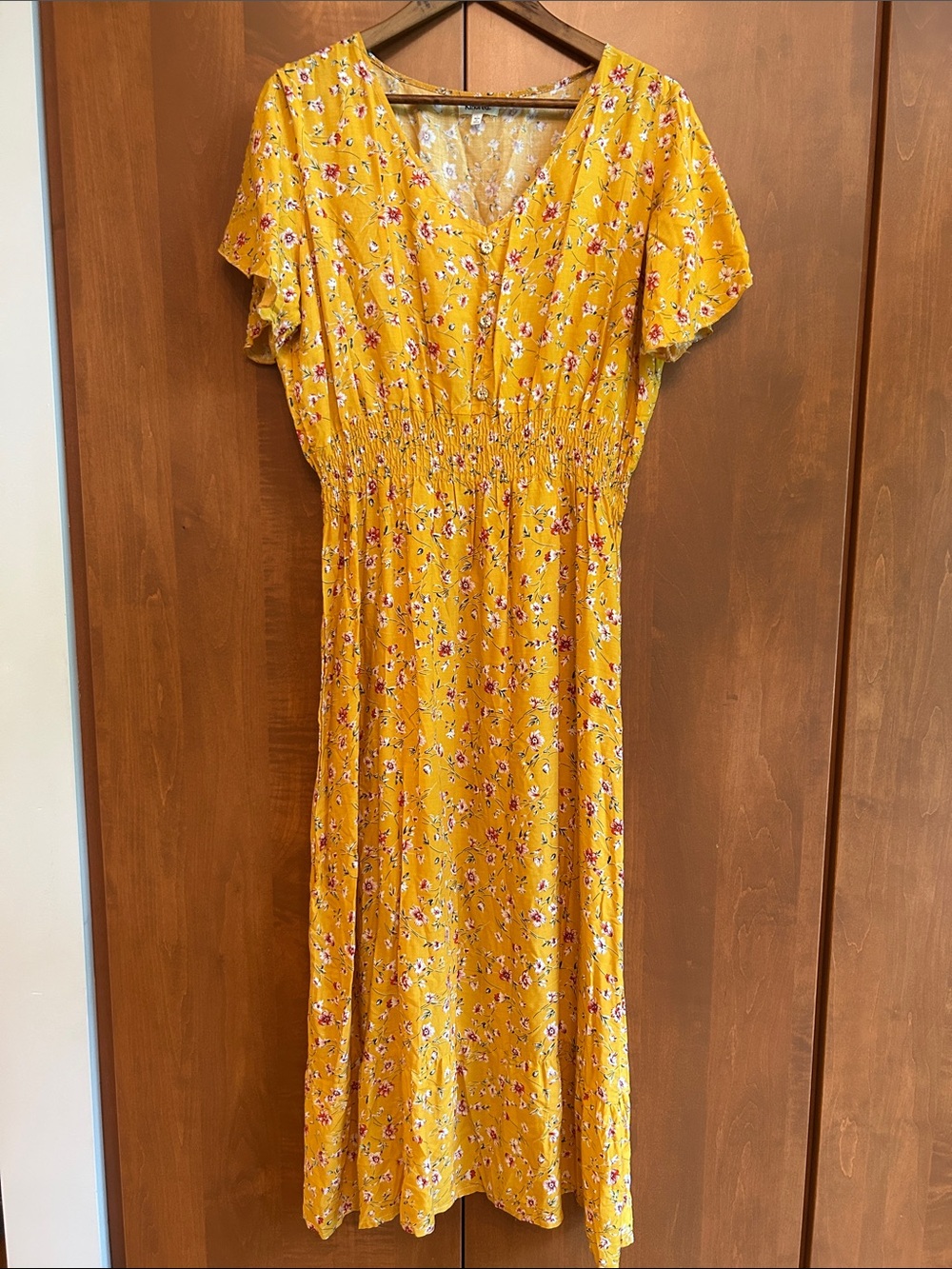 Anthropologie “Kindred” yellow Floral V‑Neck Smocked waist Dress